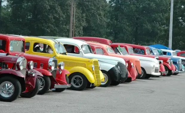 Classic car lineup after restoration and detailing service for fire, flood, and storm damage